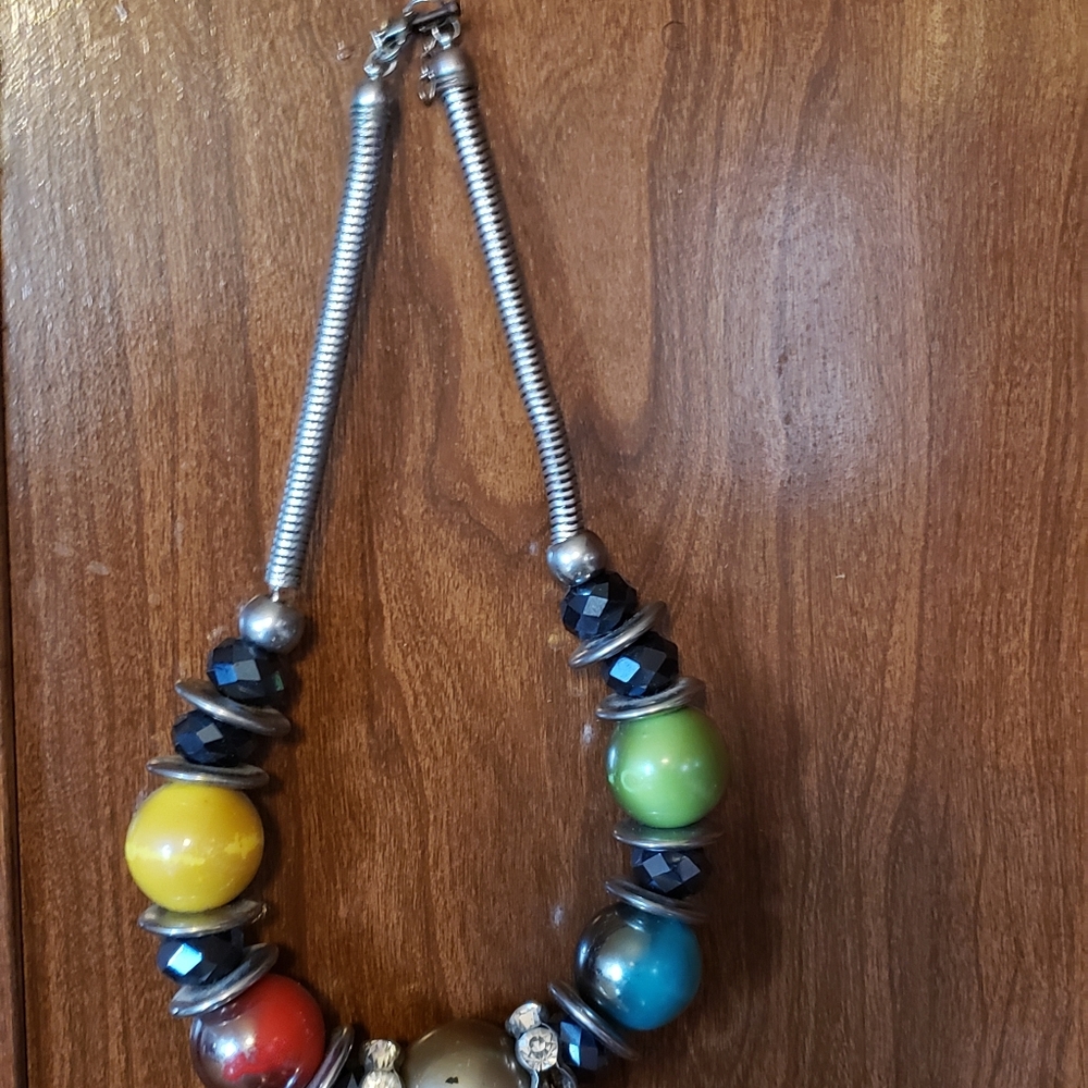 Lot of 4 fashion necklaces.Will compliment any out